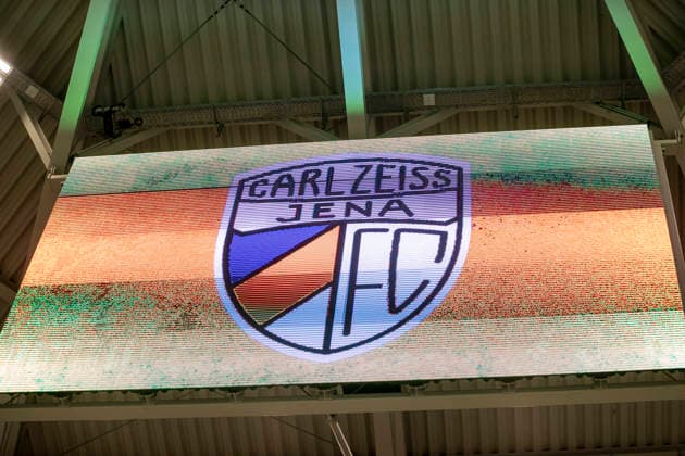 Google Pixel Frauen-Bundesliga: FC Carl Zeiss Jena vs. FC Bayern München; Jena; 11.02.2026 FC Carl Zeiss Jena Logo auf der Anzeigetafel Google Pixel Frauen-Bundesliga: FC Carl Zeiss Jena vs. FC Bayern München; ad hoc arena im Ernst-Abbe-Sportfeld; 11.02.2026 DFB REGULATIONS PROHIBIT ANY USE OF PHOTOGRAPHS AS IMAGE SEQUENCES AND OR QUASI-VIDEO. Copyright: xBEAUTIFULxSPORTS Duehringx