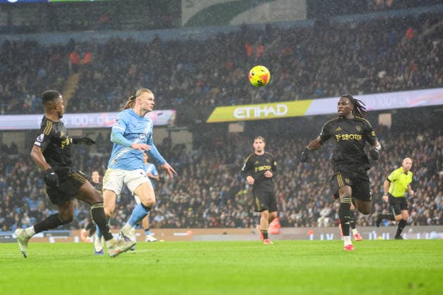 11th February 2026; Etihad Stadium, Manchester, Lancashire, England; Premier League Football, Manchester City versus Fulham; Erling Haaland of Manchester City runs for the ball tracked by Ryan Sessegnon of Fulham and Calvin Bassey  RogerxEvans Content restricted for UK based newspaper