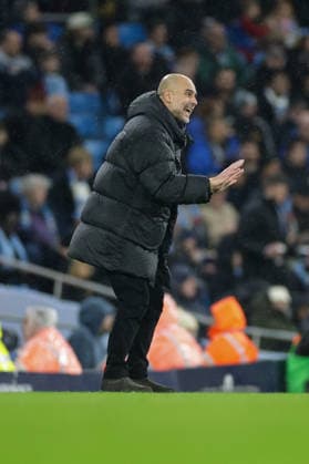 11th February 2026; Etihad Stadium, Manchester, Lancashire, England; Premier League Football, Manchester City versus Fulham; Manchester City manager Pep Guardiola talks to his players  RogerxEvans Content restricted for UK based newspaper
