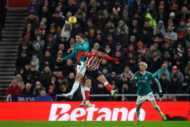 Sunderland v Liverpool, Premier League Virgil van Dijk of Liverpool beats Omar Alderete of Sunderland to a header during the Premier League match between Sunderland and Liverpool at the Stadium Of Light, Sunderland, UK on 11 February 2026. Sunderland Stadium Of Light Tyne and Wear UK Editorial use only DataCo restrictions apply See www.football-dataco.com , Copyright: xCraigxCowanx PSI-23731-0069