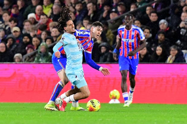 Crystal Palace v Burnley, Premier League Hannibal Mejbri Midfielder of Burnley FC goes to ground under the challenge from Jorgen Strand Larsen Forward of Crystal Palace during the Premier League match between Crystal Palace and Burnley at Selhurst Park, London, UK on 11 February 2026. London Selhurst Park Greater London UK Editorial use only DataCo restrictions apply See www.football-dataco.com , Copyright: xJeffxMoodx PSI-23733-0086