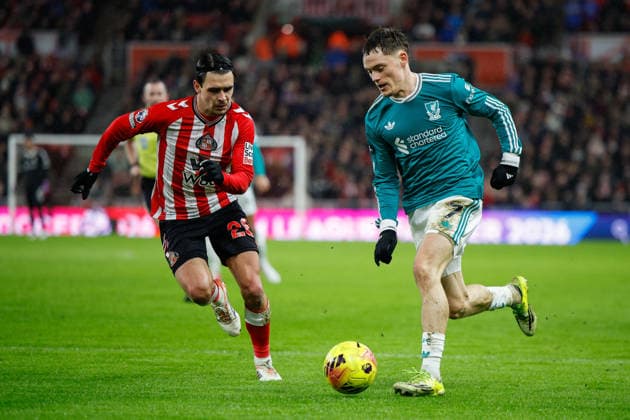 Sunderland v Liverpool, Premier League Florian Wirtz of Liverpool is closed down by Enzo Le Fee of Sunderland during the Premier League match between Sunderland and Liverpool at the Stadium Of Light, Sunderland, UK on 11 February 2026. Sunderland Stadium Of Light Tyne and Wear UK Editorial use only DataCo restrictions apply See www.football-dataco.com , Copyright: xCraigxCowanx PSI-23731-0142