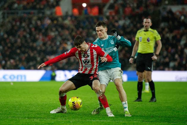 Sunderland v Liverpool, Premier League Trai Hume of Sunderland shields the ball from Florian Wirtz of Liverpool during the Premier League match between Sunderland and Liverpool at the Stadium Of Light, Sunderland, UK on 11 February 2026. Sunderland Stadium Of Light Tyne and Wear UK Editorial use only DataCo restrictions apply See www.football-dataco.com , Copyright: xCraigxCowanx PSI-23731-0162