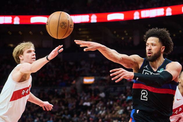 February 11, 2026, Toronto, On, Canada: Detroit Pistons Cade Cunningham (2) makes a pass over Toronto Raptors Gradey Dick (1) during second half NBA, Basketball Herren, USA basketball action in Toronto, on Wednesday, Feb. 11, 2026. Canada News - February 11, 2026  - ZUMAc35_ 20260211_zaf_c35_312 Copyright: xSammyxKoganx