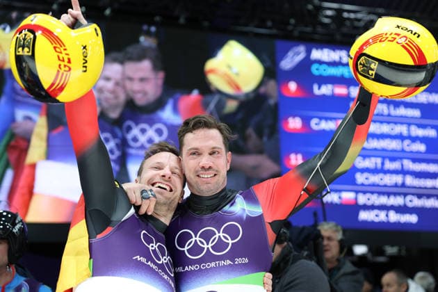 260211 -- CORTINA D AMPEZZO, Feb. 11, 2026 -- Bronze medalists Tobias Wendl Tobias Arlt of Germany celebrate after of the luge men s doubles at the Milan-Cortina 2026 Olympic Winter games, Winterspiele,Spiele, Summer games in Cortina, Italy, Feb. 11, 2026. MICO2026ITALY-CORTINA D AMPEZZO-OLYMPIC WINTER GAMES-LUGE-MEN S DOUBLES DingxXu  (MICO2026)ITALY-CORTINA D AMPEZZO-OLYMPIC WINTER GAMES-LUGE-MEN S DOUBLES IMAGO DingxXu  imago images 0847357012