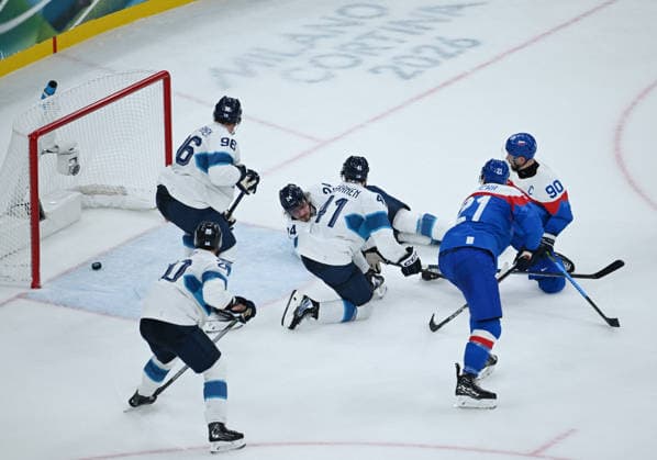 (260212) -- MILAN, Feb. 12, 2026 -- Slovakia s Adam Ruzicka (2nd R) scores during the Ice hockey, Eishockey men s preliminary round group B match between Finland and Slovakia at the Milan-Cortina 2026 Olympic Winter games, Winterspiele,Spiele, Summer games in Milan, Italy, Feb. 11, 2026. ) (MICO2026)ITALY-MILAN-OLYMPIC WINTER GAMES-ICE HOCKEY-MEN-PRELIMINARY-FIN VS SVK ZhangxHaofu 