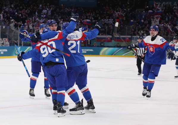 (260212) -- MILAN, Feb. 12, 2026 -- Players of Slovakia celebrate a goal during the Ice hockey, Eishockey men s preliminary round group B match between Finland and Slovakia at the Milan-Cortina 2026 Olympic Winter games, Winterspiele,Spiele, Summer games in Milan, Italy, Feb. 11, 2026. ) (MICO2026)ITALY-MILAN-OLYMPIC WINTER GAMES-ICE HOCKEY-MEN-PRELIMINARY-FIN VS SVK WangxKaiyan 