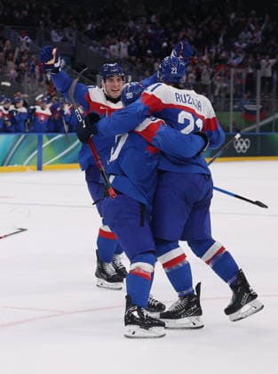(260212) -- MILAN, Feb. 12, 2026 -- Players of Slovakia celebrate a goal during the Ice hockey, Eishockey men s preliminary round group B match between Finland and Slovakia at the Milan-Cortina 2026 Olympic Winter games, Winterspiele,Spiele, Summer games in Milan, Italy, Feb. 11, 2026. ) (MICO2026)ITALY-MILAN-OLYMPIC WINTER GAMES-ICE HOCKEY-MEN-PRELIMINARY-FIN VS SVK WangxKaiyan 