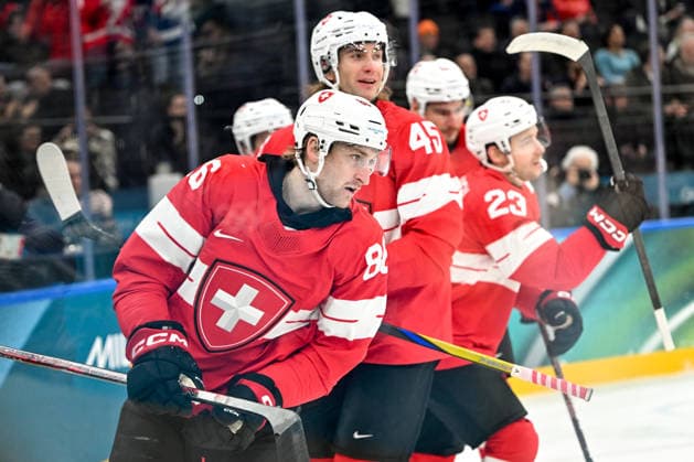 MILAN, ITALY - FEBRUARY 12: Janis Moser of Switzerland L) celebrate his goal on day six of the Milano Cortina 2026 Winter Olympic Games, Olympische Spiele, Olympia, OS at Milano Santagiulia Ice hockey, Eishockey Arena on February 12, 2026 in Milan, Italy. Milan Milano Rho Ice Hockey Arena Italy *** MILAN, ITALY FEBRUARY 12 Janis Moser of Switzerland L celebrate his goal on day six of the Milano Cortina 2026 Winter Olympic games at Milano Santagiulia Ice Hockey Arena on February 12, 2026 in Milan, Italy Milan Milano Rho Ice Hockey Arena Italy Copyright: xJustPictures.ch AndreaxBrancax jp-en-EuSpIm-AB-AAB_562012022026