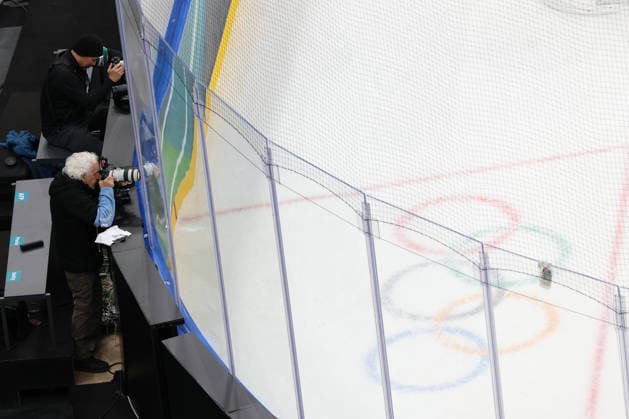 February 12, 2026, Milan, Lombardy, Italy: NHL, Eishockey Herren, USA photographer BRUCE BENNETT at work during the Men s Preliminary Round Group A game between Team Switzerland (SUI) and Team France (FRA) at the Milano Cortina 2026 Winter Olympic Games, Olympische Spiele, Olympia, OS Milan Italy - ZUMAc179 20260212_oly_c179_003 Copyright: xMickaelxChavetx