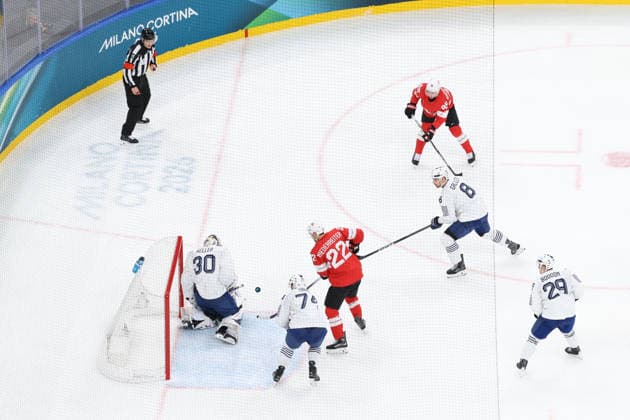 February 12, 2026, Milan, Lombardy, Italy: NINO NIEDERREITER 22 of Switzerland shoots during the Men s Preliminary Round Group A game between Team Switzerland (SUI) and Team France (FRA) at the Milano Cortina 2026 Winter Olympic Games, Olympische Spiele, Olympia, OS Milan Italy - ZUMAc179 20260212_oly_c179_009 Copyright: xMickaelxChavetx