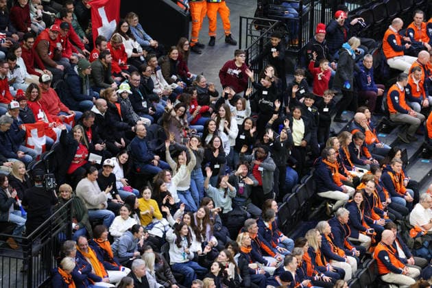 February 12, 2026, Milan, Lombardy, Italy: YOUNG FANS enjoy attending the Men s Preliminary Round Group A game between Team Switzerland (SUI) and Team France (FRA) at the Milano Cortina 2026 Winter Olympic Games, Olympische Spiele, Olympia, OS Milan Italy - ZUMAc179 20260212_oly_c179_011 Copyright: xMickaelxChavetx
