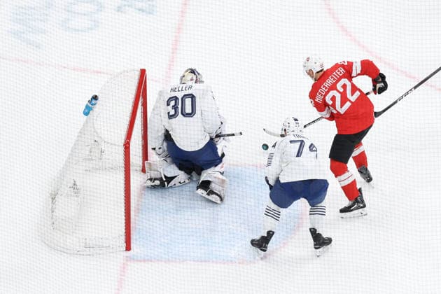 February 12, 2026, Milan, Lombardy, Italy: NINO NIEDERREITER 22 of Switzerland shoots during the Men s Preliminary Round Group A game between Team Switzerland (SUI) and Team France (FRA) at the Milano Cortina 2026 Winter Olympic Games, Olympische Spiele, Olympia, OS Milan Italy - ZUMAc179 20260212_oly_c179_014 Copyright: xMickaelxChavetx