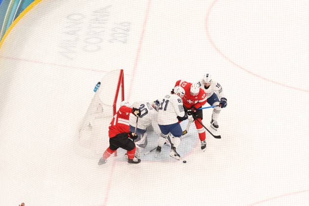 February 12, 2026, Milan, Lombardy, Italy: ANTHONY RECH 81 of France tries to score a goal in the Men s Preliminary Round Group A game between Team Switzerland (SUI) and Team France (FRA) at the Milano Cortina 2026 Winter Olympic Games, Olympische Spiele, Olympia, OS Milan Italy - ZUMAc179 20260212_oly_c179_015 Copyright: xMickaelxChavetx