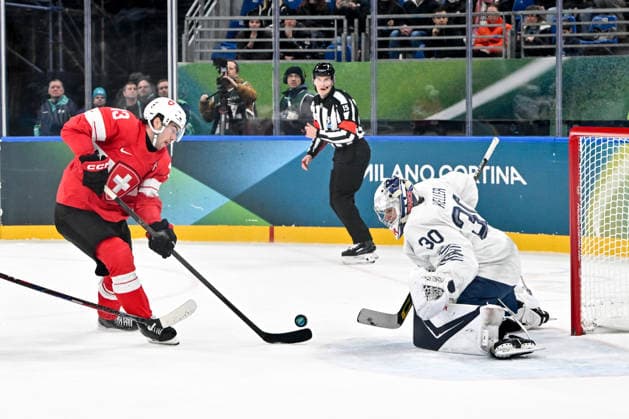 MILAN, ITALY - FEBRUARY 12: Nico Hischier of Switzerland tries to score against goalkeeper Antoine Keller of France on day six of the Milano Cortina 2026 Winter Olympic Games, Olympische Spiele, Olympia, OS at Milano Santagiulia Ice hockey, Eishockey Arena on February 12, 2026 in Milan, Italy. Milan Milano Rho Ice Hockey Arena Italy *** MILAN, ITALY FEBRUARY 12 Nico Hischier of Switzerland tries to score against goalkeeper Antoine Keller of France on day six of the Milano Cortina 2026 Winter Olympic games at Milano Santagiulia Ice Hockey Arena on February 12, 2026 in Milan, Italy Milan Milano Rho Ice Hockey Arena Italy Copyright: xJustPictures.ch AndreaxBrancax jp-en-EuSpIm-AB-AAB_695612022026