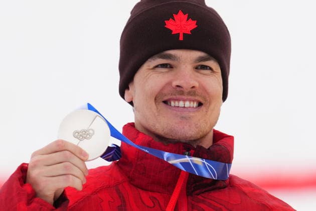 February 12, 2026, Livigno, Italy: Canada s Mikael Kingsbury displays his silver medal after the men s moguls final at the Milano Cortina 2026 Winter Olympic Games, Olympische Spiele, Olympia, OS in Livigno, Italy on Thursday, Feb. 12, 2026. Canada News - February 12, 2026  - ZUMAc35_ 20260212_zaf_c35_031 Copyright: xSeanxKilpatrickx