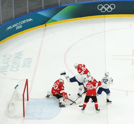 February 12, 2026, Milan, Lombardy, Italy: ENZO GUEBEY 5 of France shoots in the Men s Preliminary Round Group A game between Team Switzerland (SUI) and Team France (FRA) at the Milano Cortina 2026 Winter Olympic Games, Olympische Spiele, Olympia, OS Milan Italy - ZUMAc179 20260212_oly_c179_027 Copyright: xMickaelxChavetx