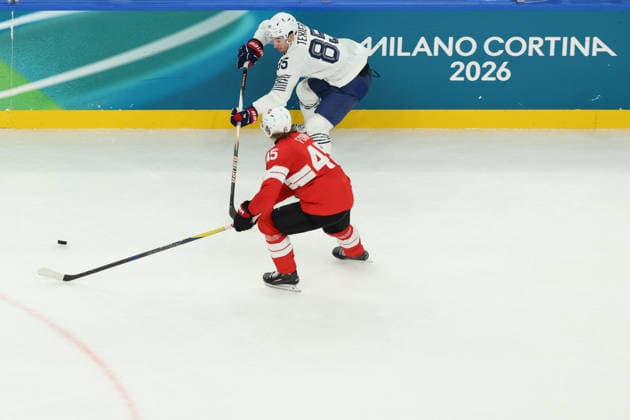 February 12, 2026, Milan, Lombardy, Italy: MICHAEL FORA 45 of Switzerland and ALEXANDRE TEXIER 85 of France in the Men s Preliminary Round Group A game between Team Switzerland (SUI) and Team France (FRA) at the Milano Cortina 2026 Winter Olympic Games, Olympische Spiele, Olympia, OS Olympics 2026: Milano Cortina: Ice hockey, Eishockey Men S: SUI:FRA  - ZUMAc179 20260212_oly_c179_032 Copyright: xMickaelxChavetx