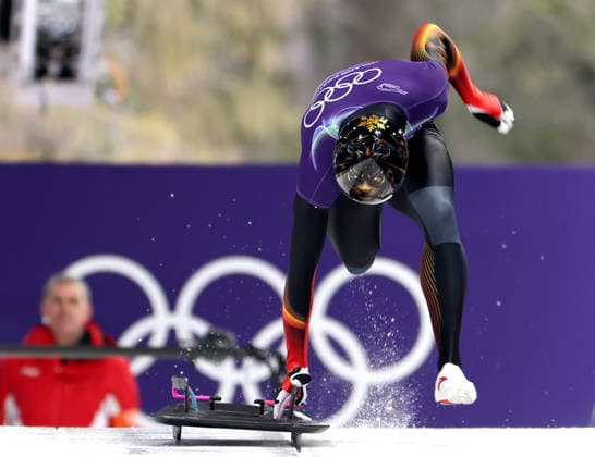 (260212) -- CORTINA D AMPEZZO, Feb. 12, 2026 -- Lin Qinwen of China competes during the skeleton men heat at the 2026 Milan-Cortina Winter Olympics in Cortina D Ampezzo, Italy, Feb. 12, 2026. ) (MICO2026)ITALY-CORTINA D AMPEZZO-OLYMPIC Winter games, Winterspiele,Spiele, Summer games SKELETON MEN-HEAT DingxXu 