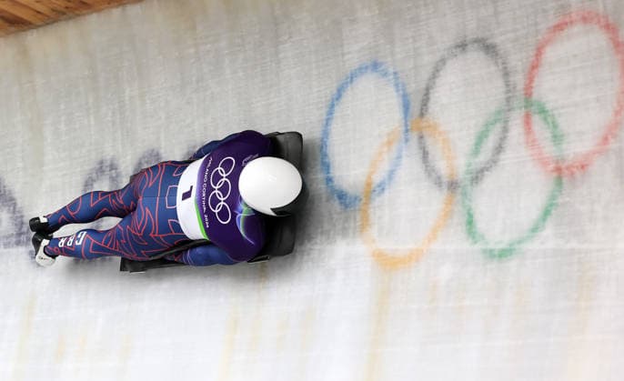 (260212) -- CORTINA D AMPEZZO, Feb. 12, 2026 -- Matt Weston of Britain competes during the skeleton men heat at the 2026 Milan-Cortina Winter Olympics in Cortina D Ampezzo, Italy, Feb. 12, 2026. ) (MICO2026)ITALY-CORTINA D AMPEZZO-OLYMPIC Winter games, Winterspiele,Spiele, Summer games SKELETON MEN-HEAT DingxXu 