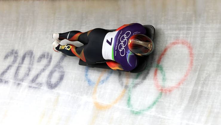 (260212) -- CORTINA D AMPEZZO, Feb. 12, 2026 -- Chen Wenhao of China competes during the skeleton men heat at the 2026 Milan-Cortina Winter Olympics in Cortina D Ampezzo, Italy, Feb. 12, 2026. ) (MICO2026)ITALY-CORTINA D AMPEZZO-OLYMPIC Winter games, Winterspiele,Spiele, Summer games SKELETON MEN-HEAT DingxXu 