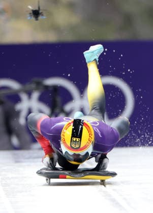 (260212) -- CORTINA D AMPEZZO, Feb. 12, 2026 -- Christopher Grotheer of Germany during the skeleton men heat at the 2026 Milan-Cortina Winter Olympics in Cortina D Ampezzo, Italy, Feb. 12, 2026. ) (MICO2026)ITALY-CORTINA D AMPEZZO-OLYMPIC Winter games, Winterspiele,Spiele, Summer games SKELETON MEN-HEAT DingxXu 