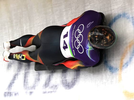 (260212) -- CORTINA D AMPEZZO, Feb. 12, 2026 -- Lin Qinwen of China competes during the skeleton men heat at the 2026 Milan-Cortina Winter Olympics in Cortina D Ampezzo, Italy, Feb. 12, 2026. ) (MICO2026)ITALY-CORTINA D AMPEZZO-OLYMPIC Winter games, Winterspiele,Spiele, Summer games SKELETON MEN-HEAT DingxXu 