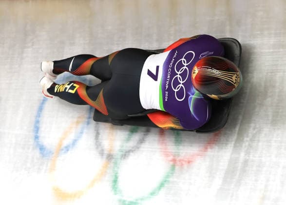 (260212) -- CORTINA D AMPEZZO, Feb. 12, 2026 -- Chen Wenhao of China competes during the skeleton men heat at the 2026 Milan-Cortina Winter Olympics in Cortina D Ampezzo, Italy, Feb. 12, 2026. ) (MICO2026)ITALY-CORTINA D AMPEZZO-OLYMPIC Winter games, Winterspiele,Spiele, Summer games SKELETON MEN-HEAT DingxXu 