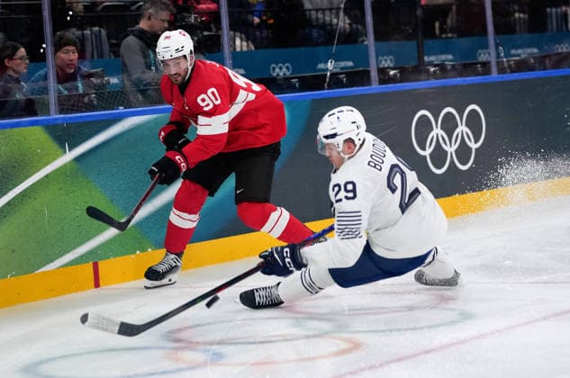 (260212) -- MILAN, Feb. 12, 2026 -- Roman Josi (L) of Switzerland competes with Louis Boudon of France during the Ice hockey, Eishockey men s preliminary round group A match between Switzerland and France at the Milan-Cortina 2026 Olympic Winter games, Winterspiele,Spiele, Summer games in Milan, Italy, Feb. 12, 2026. ) (MICO2026)ITALY-MILAN-OLYMPIC WINTER GAMES-ICE HOCKEY-MEN-PRELIMINARY-SUI VS FRA TaoxXiyi 