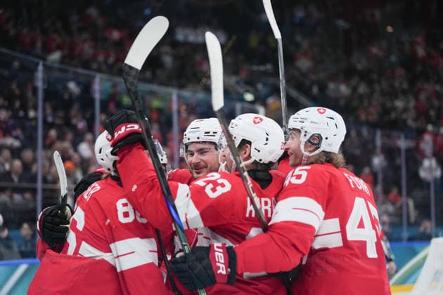 (260212) -- MILAN, Feb. 12, 2026 -- Players of Switzerland celebrate during the Ice hockey, Eishockey men s preliminary round group A match between Switzerland and France at the Milan-Cortina 2026 Olympic Winter games, Winterspiele,Spiele, Summer games in Milan, Italy, Feb. 12, 2026. ) (MICO2026)ITALY-MILAN-OLYMPIC WINTER GAMES-ICE HOCKEY-MEN-PRELIMINARY-SUI VS FRA TaoxXiyi 