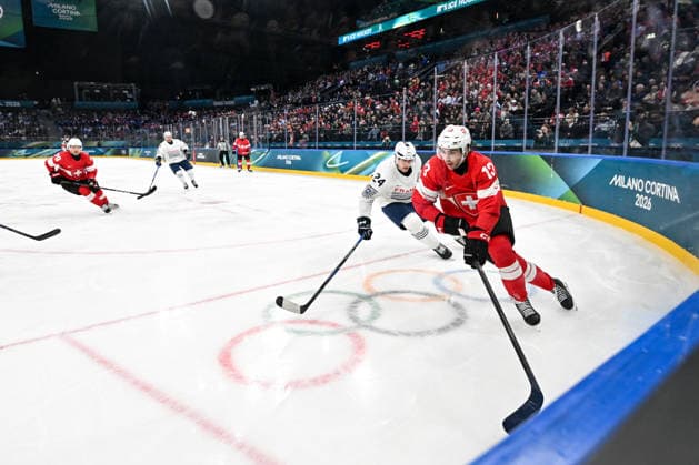 MILAN, ITALY - FEBRUARY 12: Nico Hischier of Switzerland in action chased by Justin Addamo of France on day six of the Milano Cortina 2026 Winter Olympic Games, Olympische Spiele, Olympia, OS at Milano Santagiulia Ice hockey, Eishockey Arena on February 12, 2026 in Milan, Italy. Milan Milano Rho Ice Hockey Arena Italy *** MILAN, ITALY FEBRUARY 12 Nico Hischier of Switzerland in action chased by Justin Addamo of France on day six of the Milano Cortina 2026 Winter Olympic games at Milano Santagiulia Ice Hockey Arena on February 12, 2026 in Milan, Italy Milan Milano Rho Ice Hockey Arena Italy Copyright: xJustPictures.ch AndreaxBrancax jp-en-EuSpIm-AB-DSC_859312022026