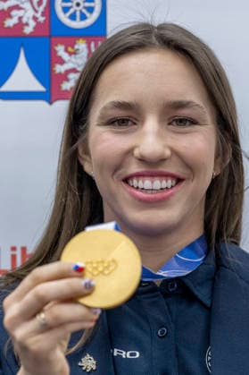 Olympic winner in snowboard parallel giant slalom Zuzana Maderova shows her gold medal during a meeting with the Governor of the Liberec Region Martin Puta, in Liberec, Czech Republic, on February 12, 2026. (CTKxPhoto RadekxPetrasek) CTKPhotoP2026021207076  CTKPhotoP2026021207076