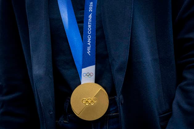 Olympic winner in snowboard parallel giant slalom Zuzana Maderova shows her gold medal during a meeting with the Governor of the Liberec Region Martin Puta, in Liberec, Czech Republic, on February 12, 2026. (CTKxPhoto RadekxPetrasek) CTKPhotoP2026021207166  CTKPhotoP2026021207166