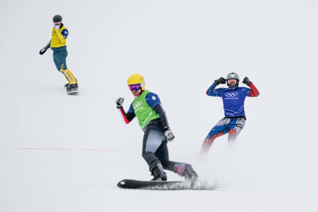 XXV Winter Olympic Games, Olympische Spiele, Olympia, OS in Livigno, Italy, on February 12, 2026. Snowboard Men s Snowboard Cross 1 8 Finals. From left: Jarryd Hughes of Australia, Jakob Dusek of Austria and Krystof Choura of the Czech Republic. (CTKxPhoto DavidxTanecek) CTKPhotoP2026021206834  CTKPhotoP2026021206834