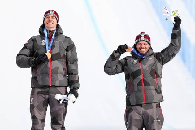 OLYMPICS - Winter Olympic Games, Olympische Spiele, Olympia, OS Milano Cortina 2026 LIVIGNO,ITALY,12.FEB.26 - OLYMPICS, SNOWBOARD - Winter Olympic Games Milano Cortina 2026, Snowboard Cross, men, final, medal ceremony. Image shows the rejoicing of Alessandro Haemmerle (AUT) and Jakob Dusek (AUT). Keywords: medal.  GEPAxpictures xHaraldxSteiner