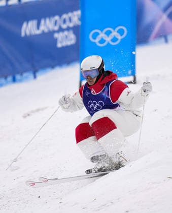 Milan Cortina Olympics: Freestyle skiing Mikael Kingsbury of Canada competes en route to winning the men s freestyle skiing moguls silver at the Milan Cortina Olympics on Feb. 12, 2026, at Livigno Aerials &amp; Moguls Park in Livigno, Italy.  A14AA0005274596P