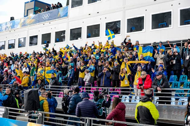 OLYMPICS - Winter Olympic Games, Olympische Spiele, Olympia, OS Milano Cortina 2026 TESERO,ITALY,12.FEB.26 - OLYMPICS, NORDIC SKIING, CROSS COUNTRY SKIING - Winter Olympic Games Milano Cortina 2026, 10km women, interval start free. Image shows fans of Sweden.  GEPAxpictures xMatthiasxTrinkl