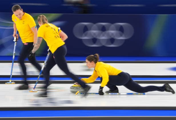 (260212) -- CORTINA D AMPEZZO, Feb. 12, 2026 -- Anna Hasselborg (R) of Sweden competes during the curling women round robin session 1 match between Sweden and Japan at the 2026 Milan-Cortina Winter Olympics in Cortina D Ampezzo, Italy, Feb. 12, 2026. ) (MICO2026)ITALY-CORTINA D AMPEZZO-OLYMPIC Winter games, Winterspiele,Spiele, Summer games CURLING-WOMEN-ROUND ROBIN-SWE VS JPN LixGang 