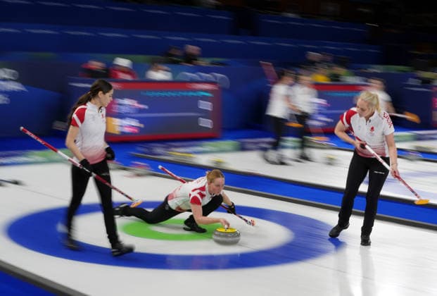 (260212) -- CORTINA D AMPEZZO, Feb. 12, 2026 -- Mathilde Halse (C) of Denmark competes during the curling women round robin session 1 match between Canada and Denmark at the 2026 Milan-Cortina Winter Olympics in Cortina D Ampezzo, Italy, Feb. 12, 2026. ) (MICO2026)ITALY-CORTINA D AMPEZZO-OLYMPIC Winter games, Winterspiele,Spiele, Summer games CURLING-WOMEN-ROUND ROBIN-CAN VS DEN LixGang 