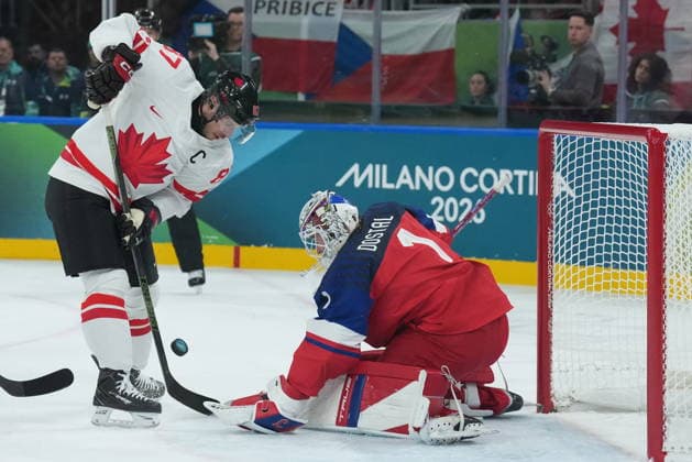 February 12, 2026, Milan, ITALY: Lukas Dostal (1) of Team Czechia makes a save on Sidney Crosby (87) of Team Canada during first period men s Olympic hockey action at the 2026 Milan Cortina Winter Olympics in Milan, Italy on Thursday, February 12, 2026. Canada News - February 12, 2026  - ZUMAc35_ 20260212_zaf_c35_088 Copyright: xNathanxDenettex