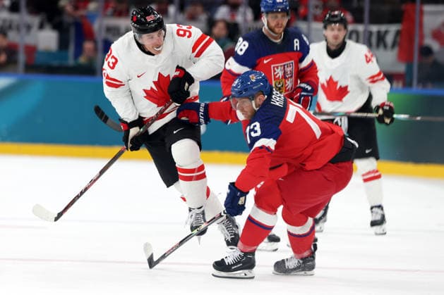 Milano Cortina 2026, Milan, Italy, 12.02, 2026, MiCo2026, MiCo, 2026, Olympics, Olympic, Winter Olympic, Olympic Winter games, Winterspiele,Spiele, Summer games Ice hockey, Eishockey Canada, Czechia Mitch Marner of Canada and Ondrej Kase of Czechia in action during men™s Premilinary round Group A Ice Hockey match between Canada and Czechia teams of Milano Cortina 2026 Olympic Winter Games in Milan, Italy, 12.02.2026. Photo: Roman Koksarov (RKF) Milan Italy Copyright: xRomanxKoksarovx 0B4A1376.JPG
