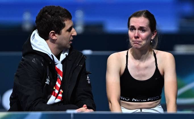 Speed skating, Eisschnelllauf coach Daniel Greig and Belgian speed skater Sandrine Tas react after the Women s 5000m speed skating race at the Milano Cortina 2026 Olympic Winter games, Winterspiele,Spiele, Summer games on Thursday 12 February 2026 in Milan, Italy. The XXV Winter Olympics take place from 6 to 22 February 2026 in Italy. JASPERxJACOBS  x162943569x