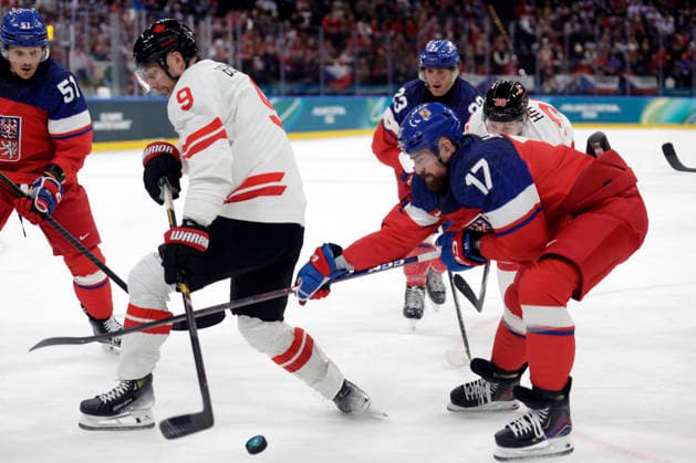 Milano Cortina 2026, Milan, Italy, 12.02, 2026, MiCo2026, MiCo, 2026, Olympics, Olympic, Winter Olympic, Olympic Winter games, Winterspiele,Spiele, Summer games Ice hockey, Eishockey Canada, Czechia Sam Bennett of Canada and Filip Hronek of Czechia in action during men™s Premilinary round Group A Ice Hockey match between Canada and Czechia teams of Milano Cortina 2026 Olympic Winter Games in Milan, Italy, 12.02.2026. Photo: Roman Koksarov (RKF) Milan Italy Copyright: xRomanxKoksarovx _23A3290.JPG