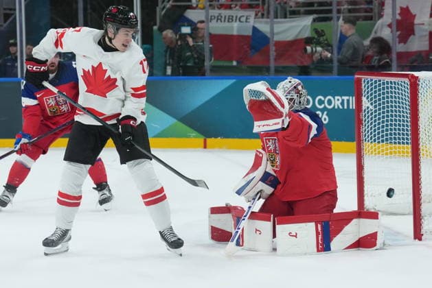 February 12, 2026, Milan, ITALY: Macklin Celebrini (17) of Team Canada tips the puck past Lukas Dostal (1) of Team Czechia for a goal during first period men s Olympic hockey action at the 2026 Milan Cortina Winter Olympics in Milan, Italy on Thursday, February 12, 2026. Canada News - February 12, 2026  - ZUMAc35_ 20260212_zaf_c35_110 Copyright: xNathanxDenettex