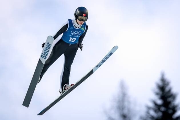OLYMPICS - Winter Olympic Games, Olympische Spiele, Olympia, OS Milano Cortina 2026 PREDAZZO,ITALY,12.FEB.26 - OLYMPICS, NORDIC SKIING, Ski jumping, Skispringen, Ski, nordisch - Winter Olympic Games Milano Cortina 2026, large hill, women, training. Image shows Bing Dong (CHN).  GEPAxpictures xMatthiasxTrinkl