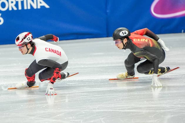 2026-02-12 - Milano Cortina 2026 Winter Olympics MILAN, ITALY - FEBRUARY 12: Felix Roussel of Canada, Shaoang Liu of China performing on the Short Track Speed skating, Eisschnelllauf Men s 1000m Quaterfinals during the Milano Cortina 2026 Winter Olympics at the Milano Ice Skating Arena on February 12, 2026 in Milan, Italy Milan Milano Ice Skating Arena Italy Content not available for redistribution in The Netherlands directly or indirectly through any third parties. Copyright: xAndrexWeeningx