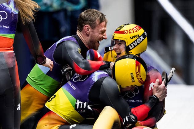 CORTINA, ITALY - FEBRUARY 12: Julia Taubitz (Germany), Tobias Wendl Tobias Arlt (Germany), Max Langenhan (Germany), Dajana Eitberger Magdalena Matschina (Germany) hug after winning Gold during the Luge Team Relay at the Milano Cortina 2026 Olympics at Cortina Sliding Centre on day 6 of the Milano Cortina 2026 Olympics on February 12, 2026 in Cortina, Italy. Editorial use only. Italy Copyright: xSteffiexWunderlx