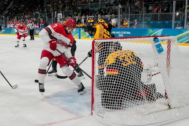 Alexander True (Denmark), Wojciech Stachowiak (Germany) und Philipp Grubauer (Germany) battle for the puck during the Ice hockey, Eishockey Men - Preliminary Round - Group C match between Germany v Denmark on day six of the Milano Cortina 2026 Winter Olympic Games, Olympische Spiele, Olympia, OS at Milano Rho Ice Hockey Arena on February 12, 2026 in Milan, Italy. (Photo by Alex Gottschalk DeFodi Images) - *** Alexander True Denmark , Wojciech Stachowiak Germany and Philipp Grubauer Germany battle for the puck during the Ice Hockey Men Preliminary Round Group C match between Germany v Denmark on day six of the Milano Cortina 2026 Winter Olympic games at Milano Rho Ice Hockey Arena on February 12, 2026 in Milan, Italy Photo by Alex Gottschalk DeFodi Images