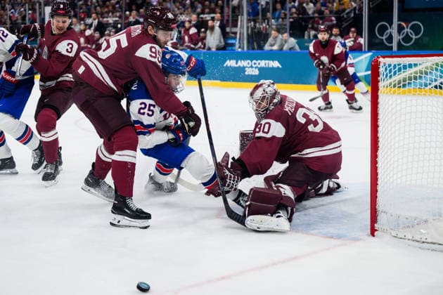 260212 Charlie McAvoy of USA against Oskars Batna and goaltender Elvis Merzlikins in the men s Ice hockey, Eishockey game between Latvia and USA during day 6 of the 2026 Winter Olympics on February 12, 2026 in Milan. Photo: Carl Sandin BILDBYRAN kod CS CS0875 ishockey ice hockey Olympic Games, Olympische Spiele, Olympia, OS olympics winter olympics os ol olympiska spel vinter-os olympiske leker milano cortina 2026 milan cortina 2026 milano cortina 2026 olympic games milano cortina 2026 winter olympic games milano cortina-os milano cortina-ol vinter-ol 6 bbeng lettland latvia usa *** 260212 Charlie McAvoy of USA against Oskars Batna and goaltender Elvis Merzlikins in the men s ice hockey game between Latvia and USA during day 6 of the 2026 Winter Olympics on February 12, 2026 in Milan Photo Carl Sandin BILDBYRAN kod CS CS0875 ishockey ice hockey olympic games olympics winter olympics os ol olympiska spel vinter os olympiske leker milano cortina 2026 milan cortina 2026 milano cortina 2026 olympic games milano cortina 2026 winter olympic games milano cortina os milano cortina ol vinter ol 6 bbeng lettland latvia usa  Copyright: CARLxSANDIN BB260212CS202