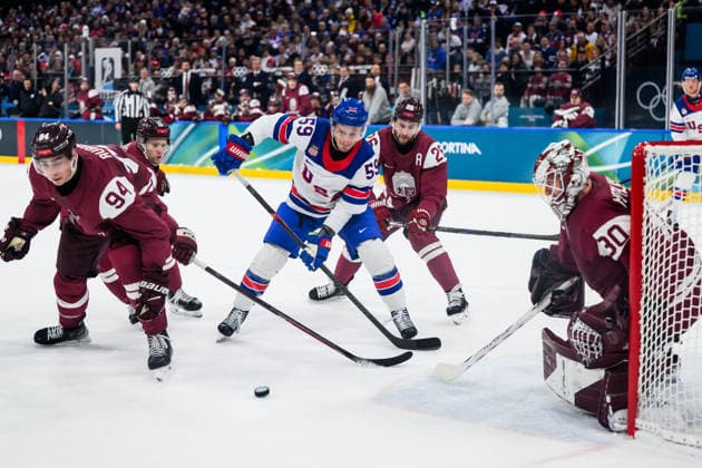 260212 Jake Guentzel of USA against Uvis Janis Balinskis and goaltender of Latvia in the men s Ice hockey, Eishockey game between Latvia and USA during day 6 of the 2026 Winter Olympics on February 12, 2026 in Milan. Photo: Carl Sandin BILDBYRAN kod CS CS0875 ishockey ice hockey Olympic Games, Olympische Spiele, Olympia, OS olympics winter olympics os ol olympiska spel vinter-os olympiske leker milano cortina 2026 milan cortina 2026 milano cortina 2026 olympic games milano cortina 2026 winter olympic games milano cortina-os milano cortina-ol vinter-ol 6 bbeng lettland latvia usa *** 260212 Jake Guentzel of USA against Uvis Janis Balinskis and goaltender of Latvia in the men s ice hockey game between Latvia and USA during day 6 of the 2026 Winter Olympics on February 12, 2026 in Milan Photo Carl Sandin BILDBYRAN kod CS CS0875 ishockey ice hockey olympic games olympics winter olympics os ol olympiska spel vinter os olympiske leker milano cortina 2026 milan cortina 2026 milano cortina 2026 olympic games milano cortina 2026 winter olympic games milano cortina os milano cortina ol vinter ol 6 bbeng lettland latvia usa  Copyright: CARLxSANDIN BB260212CS207
